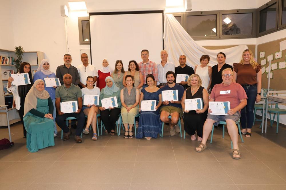 תמונה קבוצתית של מסיימי קורס גישור